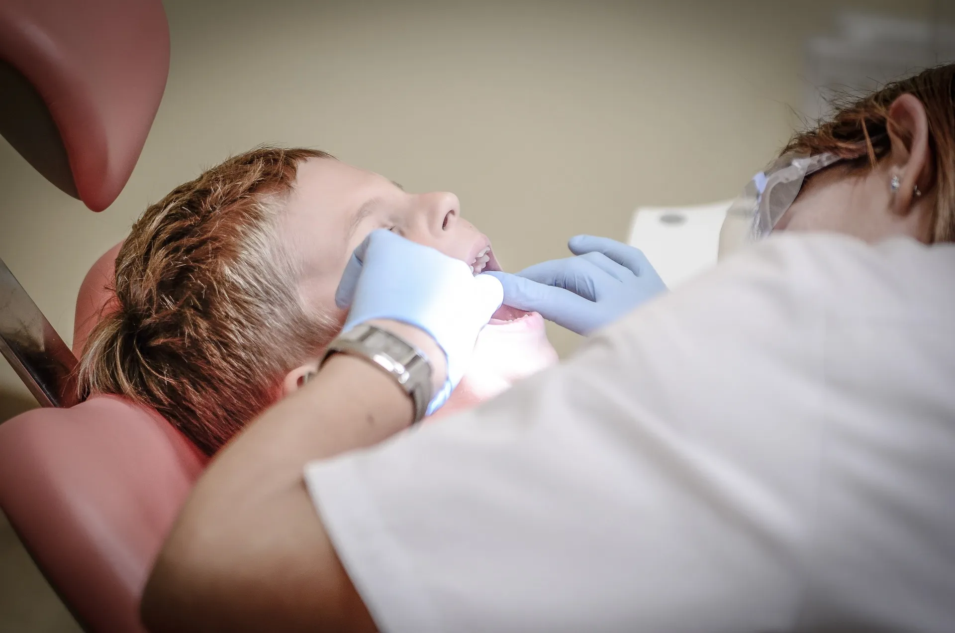 Smiling Children Receiving Gentle Dental Care in Holland Village